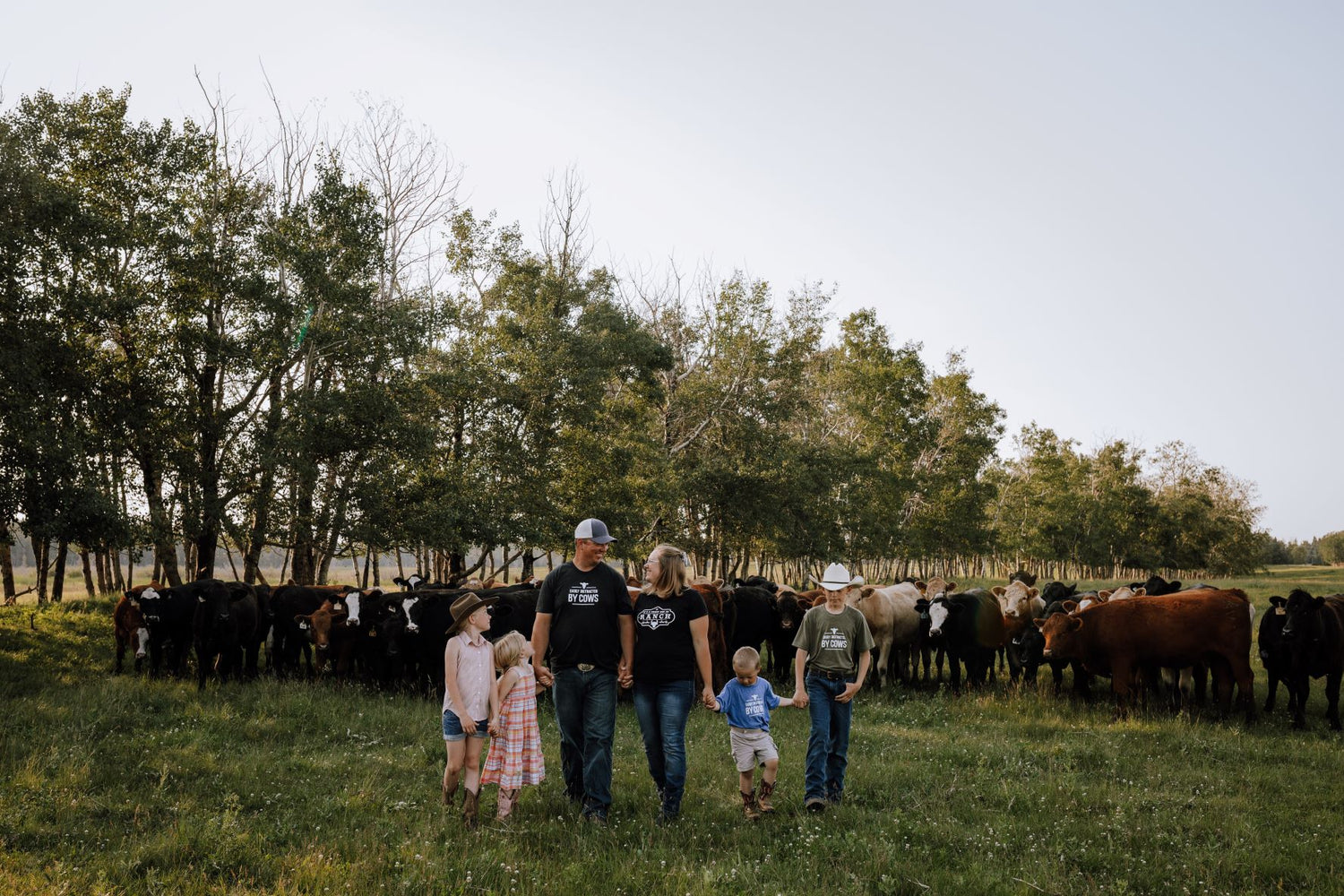 Vaadeland family with their replacement heifer herd